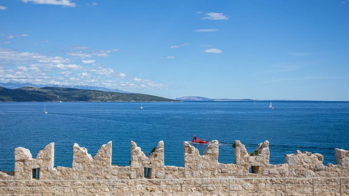 Sea and ramparts tops in town Krk 